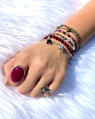 A Lifetime of Adventure NTIO Charm Bracelet/Choker by Craig Mabbit