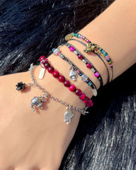 A Lifetime of Adventure NTIO Charm Bracelet/Choker by Craig Mabbit