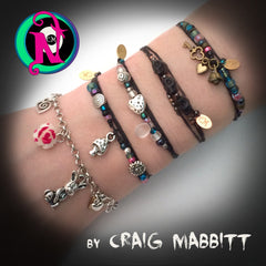 A Lifetime of Adventure NTIO Charm Bracelet/Choker by Craig Mabbit