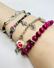 A Lifetime of Adventure NTIO Charm Bracelet/Choker by Craig Mabbit