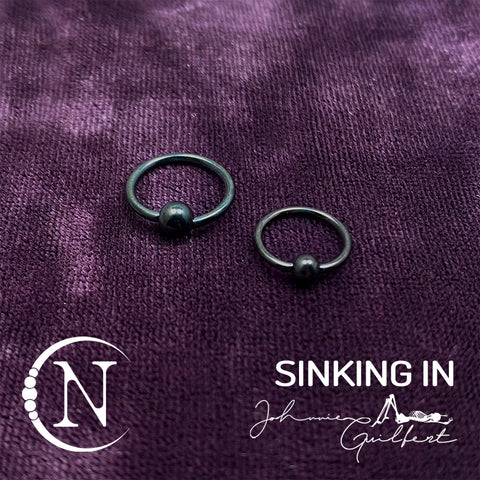 Sinking In Lip Rings by Johnnie Guilbert